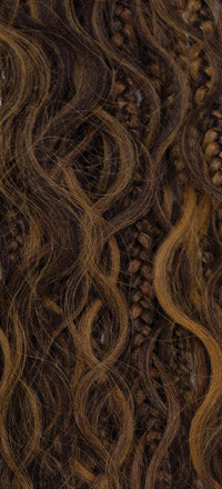 Close-up of Freetress Bora Bora Boho Locs, a mix of wavy dark brown and caramel strands with braided sections.