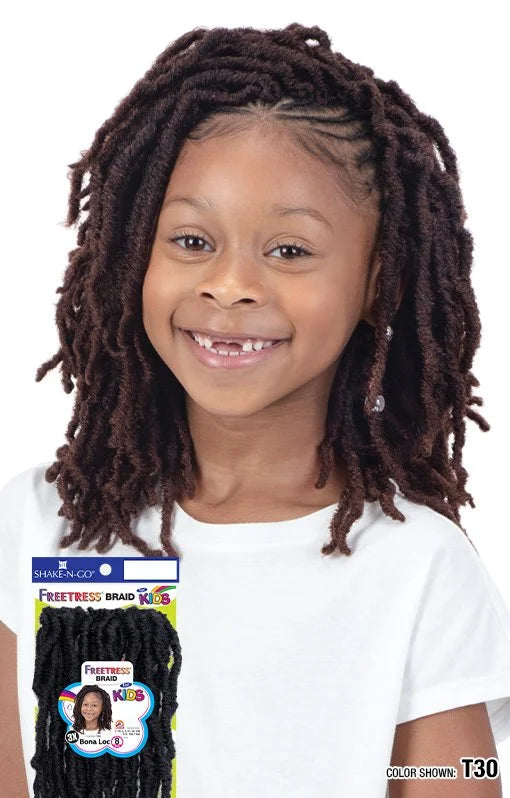 Smiling girl models Freetress Braid Kids-Bona Locs in shoulder-length T30 brown crochet faux locs. Product packaging inclu...