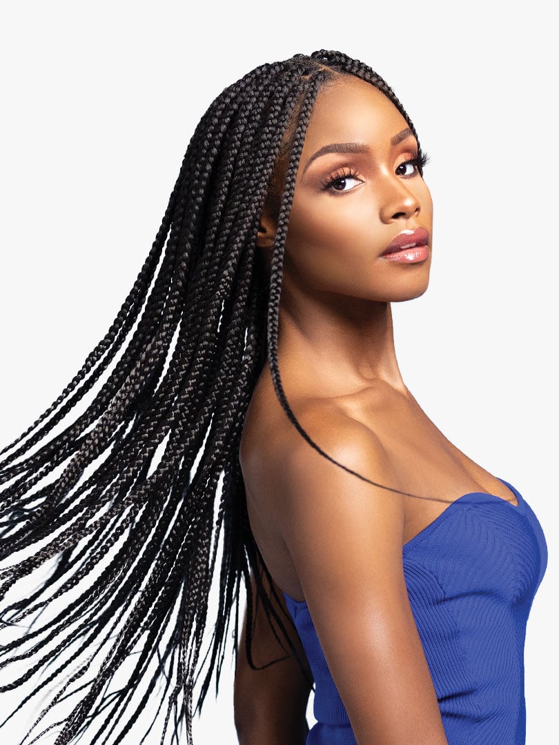 Smiling woman with long, flowing Ruwa 6X Pre-Stretched 48" Braids in black, looking over her shoulder.