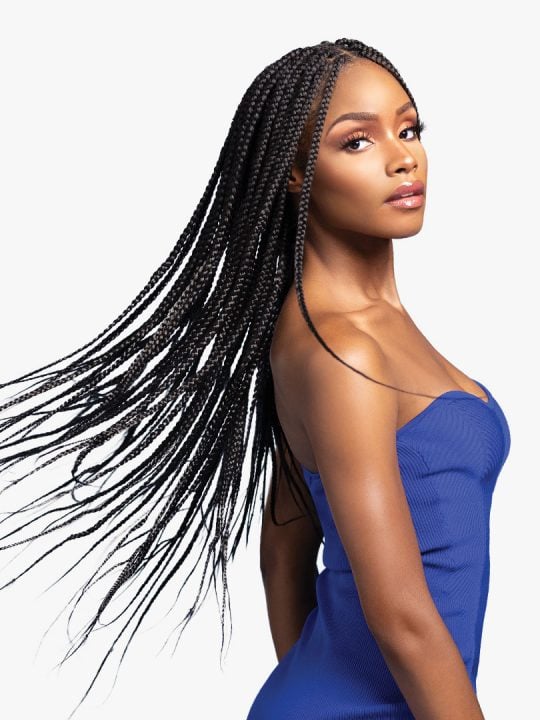 A woman models Ruwa 2X Pre-Stretched Braid 60" with flowing, extra long black box braids parted down the middle.