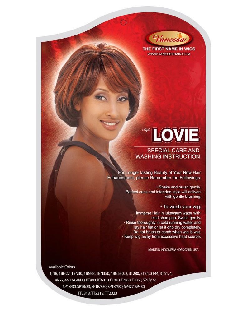 Packaging for Vanessa LOVIE wig features a woman with a chin-length, voluminous, layered reddish-brown bob with bangs.