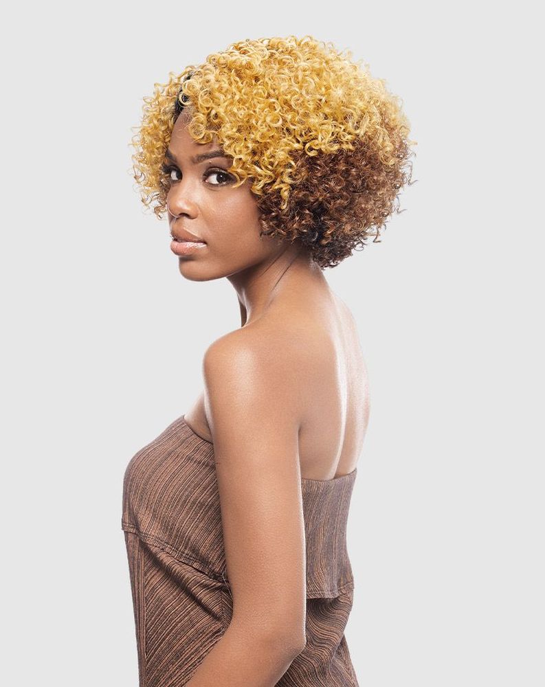 Vanessa SUPER C BEOLA wig on woman with short, bouncy, two-tone blonde on top and brown underneath curly hair.