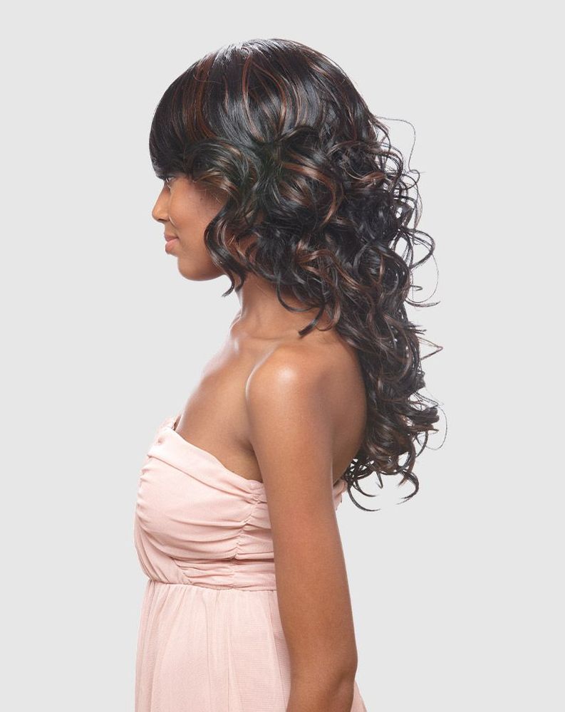 Woman in Vanessa SUPER MOON Synthetic Wig with long, layered dark brown hair, reddish highlights, full bangs, and loose cu...