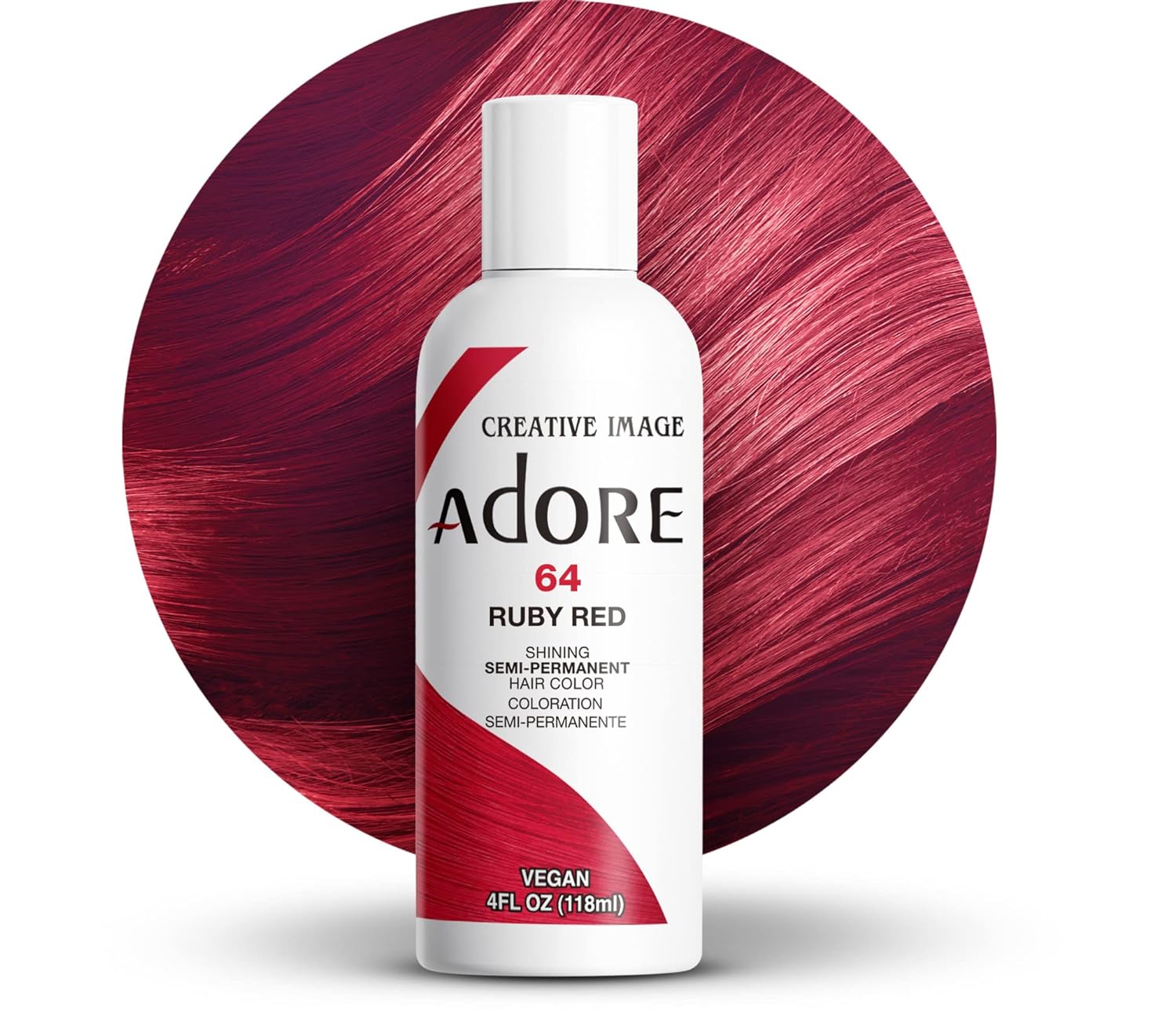 Creative Image Adore #064 Ruby Red hair color bottle, in front of a circular swatch of vibrant, shiny ruby red hair.