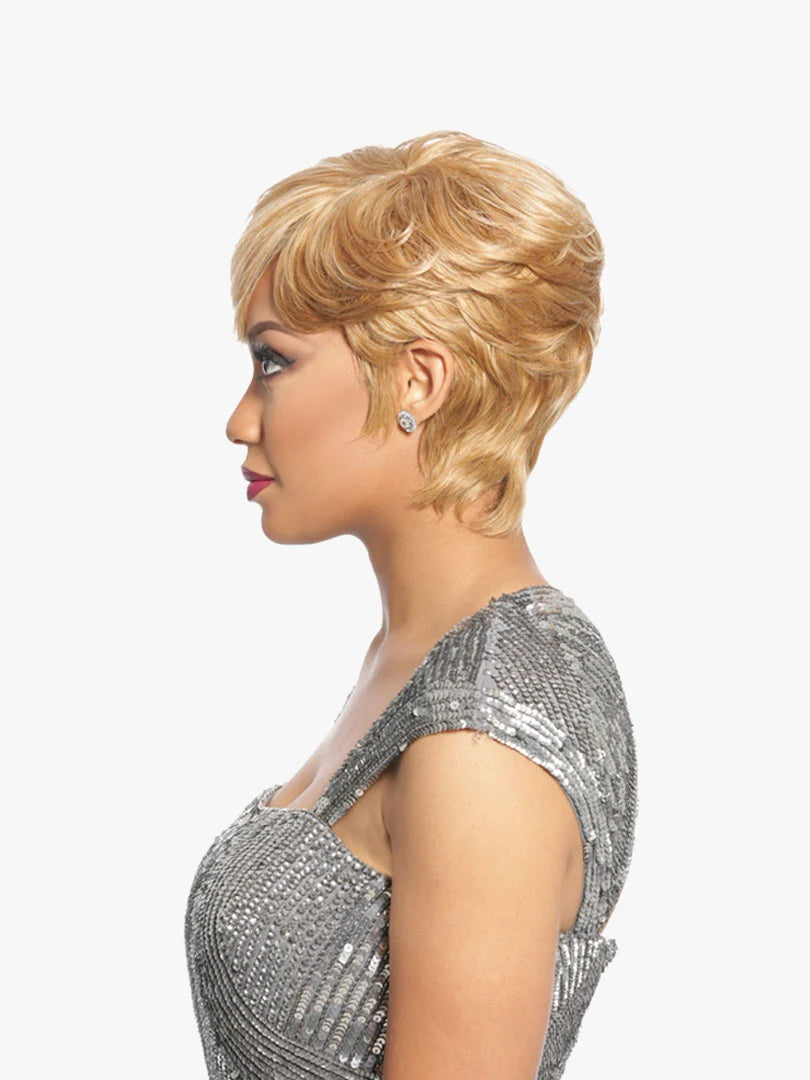Woman with styled hair wearing a silver sequin dress on a white background