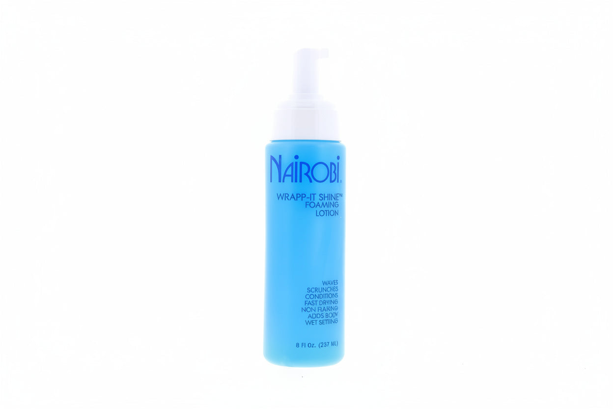 Product packaging for Nairobi Wrapp-It Shine Foaming Lotion. A light blue 8oz bottle with a white pump top.