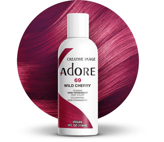 Creative Image Adore #069 Wild Cherry hair color bottle with a circular swatch of glossy magenta hair.