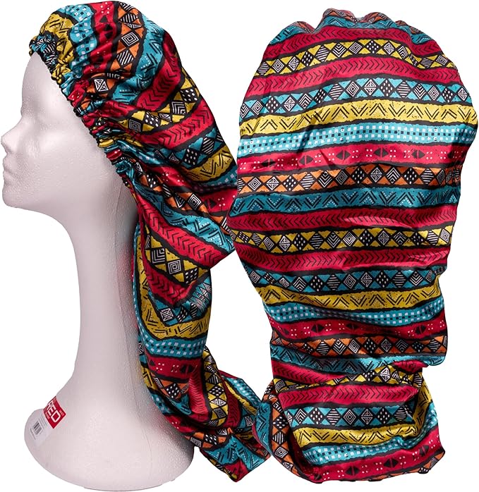 RED By Kiss Aztec Satin Bonnet displayed on a mannequin head with another unfolded. Features vibrant red, yellow, and blue...
