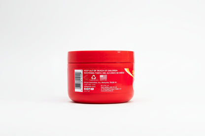 Red container with a label on a white background