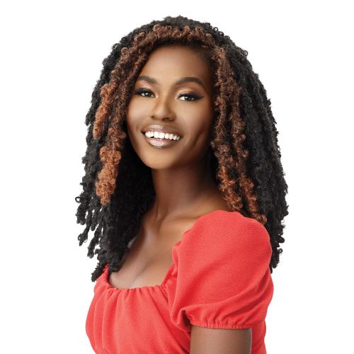 Smiling woman wearing X-Pression Twisted Up Original Butterfly Locs 12". Black textured locs with auburn highlights.