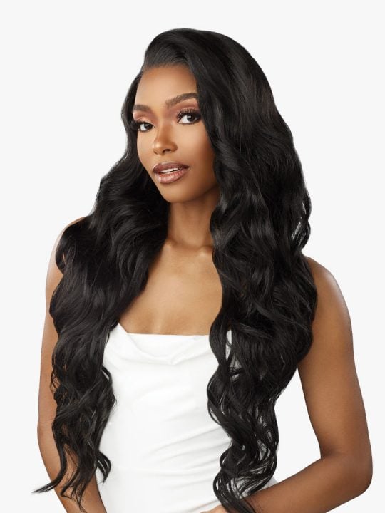 Woman wearing Bare Lace Full Lace Unit 8 - Synthetic Lace Front Wig. Long black wavy hair with a deep side part.