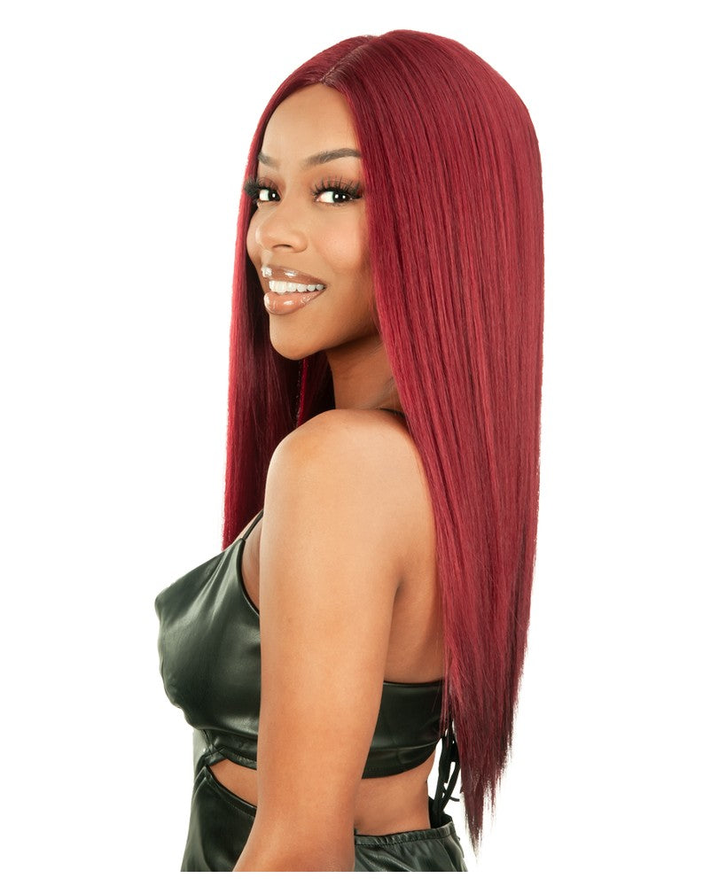New Born Free CUTIE Lace Parting Wig CTLP01 – Angled Bob worn by a woman with long, straight, vibrant red hair, center par...