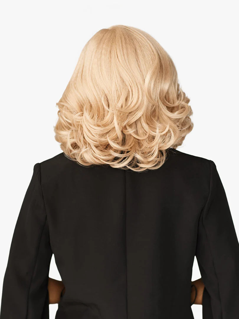 Rear view of a person wearing the Butta Chic Bob Lace Wig LOB Unit 7, a bouncy, golden blonde curly long bob.