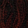Close-up of X-PRESSION BRAID-PRE STRETCHED BRAID 32 3X with blended dark brown and reddish-brown textured strands.