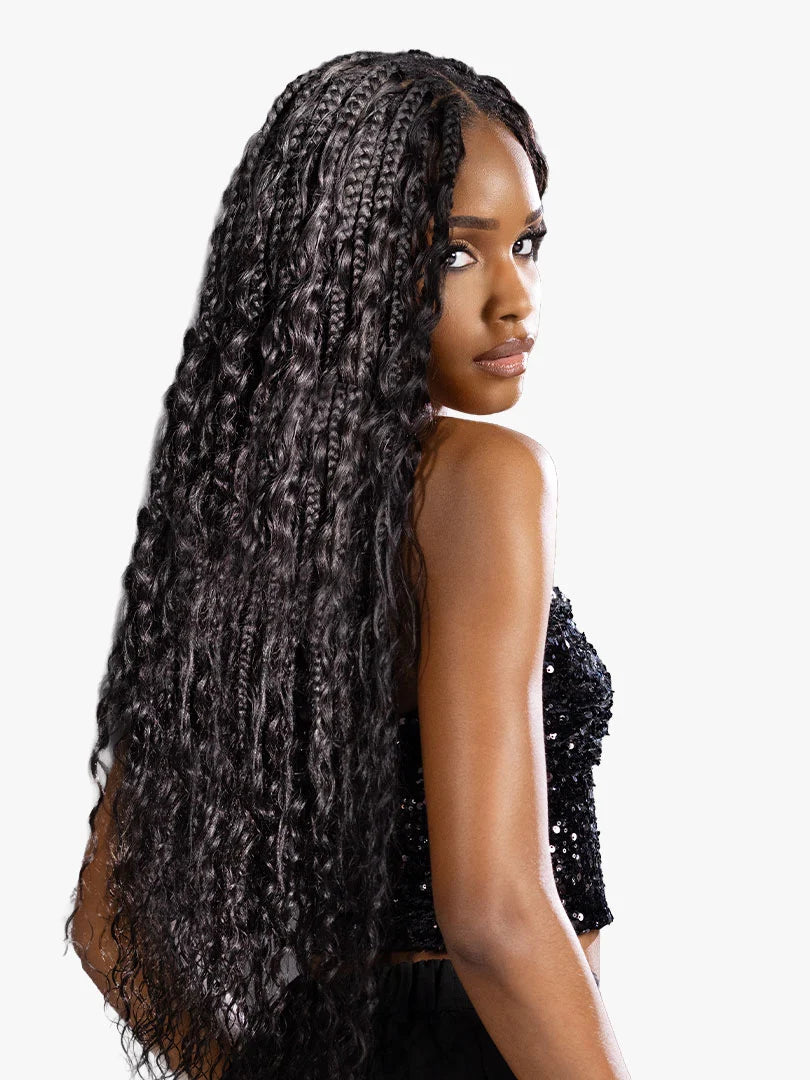 Woman models long, dark gray and black Empire 100% Human Hair Feather Crochet Jerry Curl.