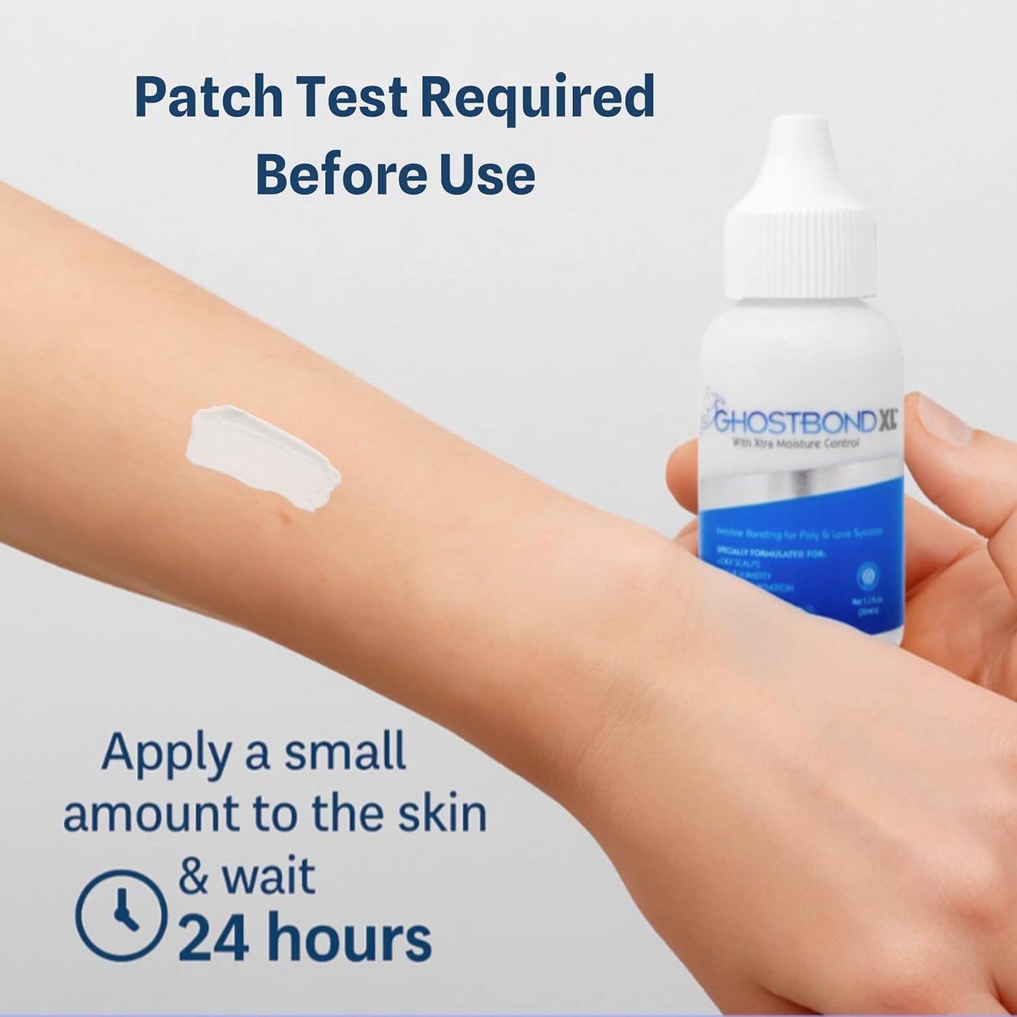 Close-up of an arm with a white patch test application of Ghost Bond XL adhesive, held by a hand.