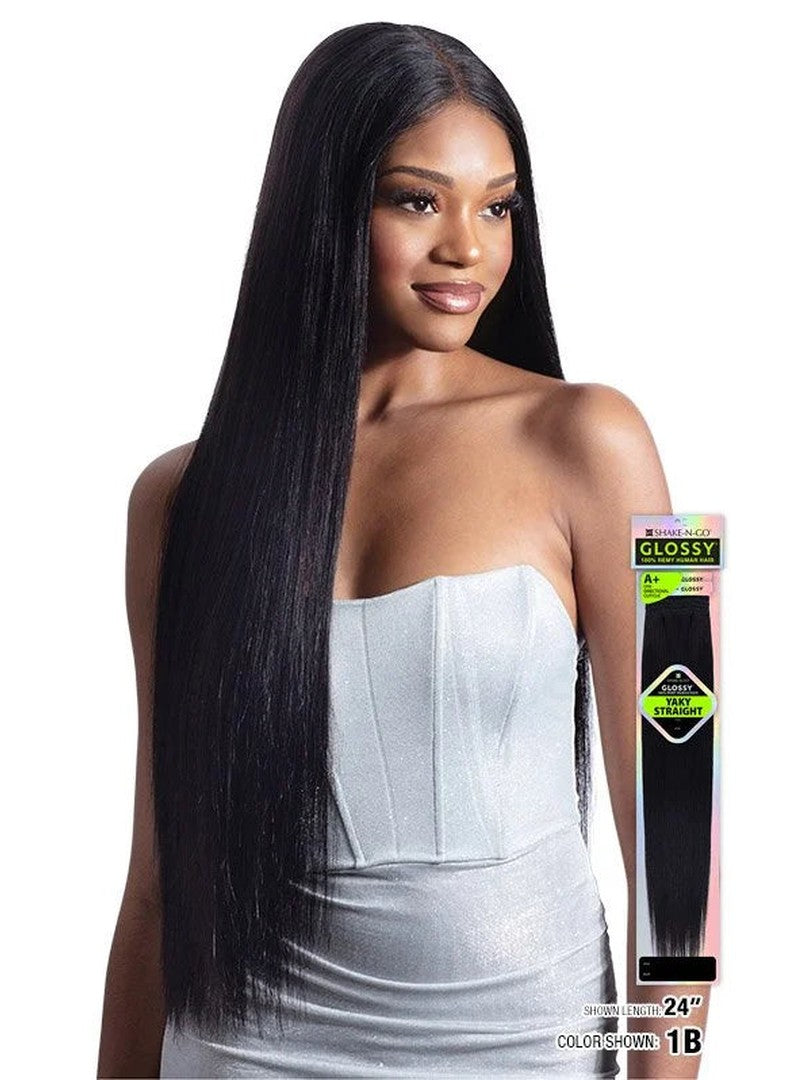Woman models waist-length, black Shake-N-Go Glossy A+ Yaky Straight hair, with product packaging visible.