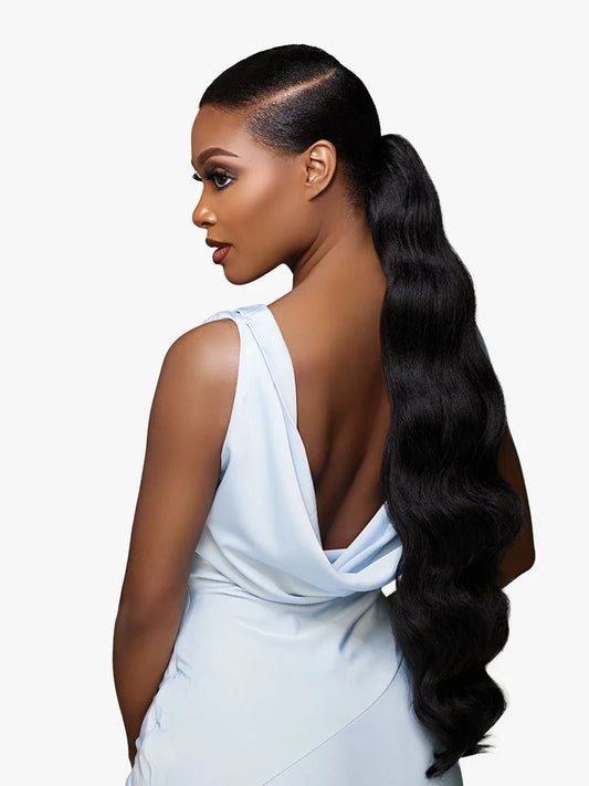 Woman wearing GLAMORA Glam Updo Unit 6: sleek black high ponytail with long, voluminous waves.