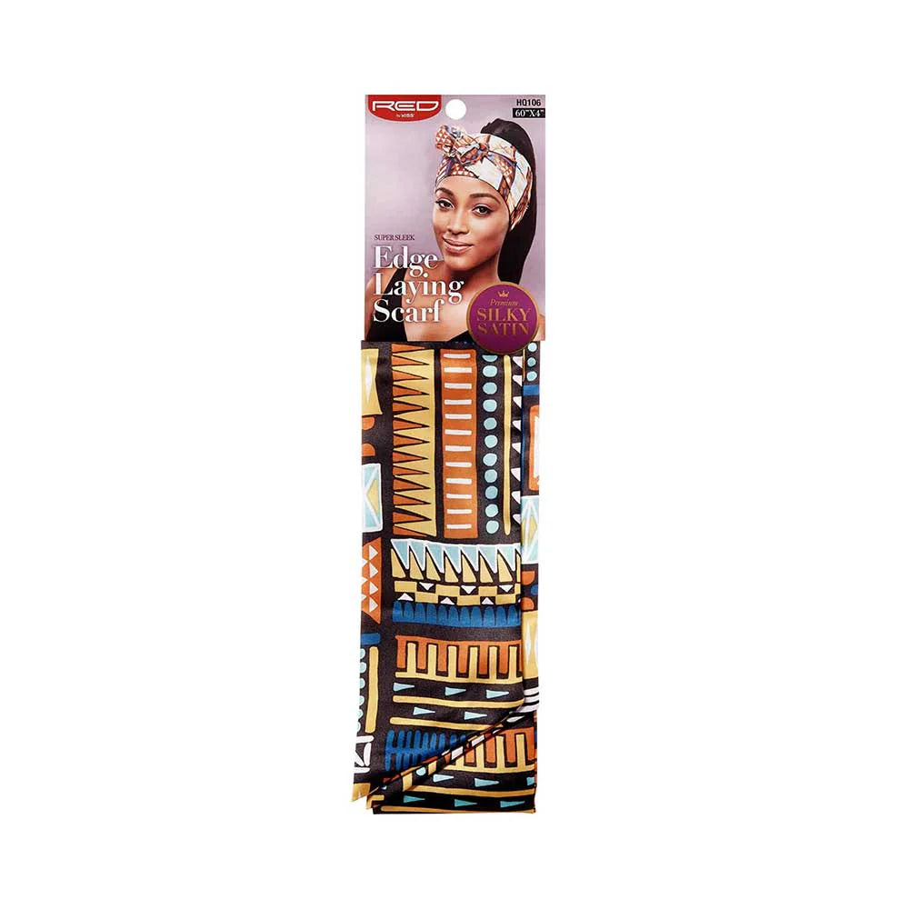 RED By Kiss Edge Laying Scarf packaging. A woman wears the Aztec-patterned scarf. Scarf has orange, blue, yellow, black de...