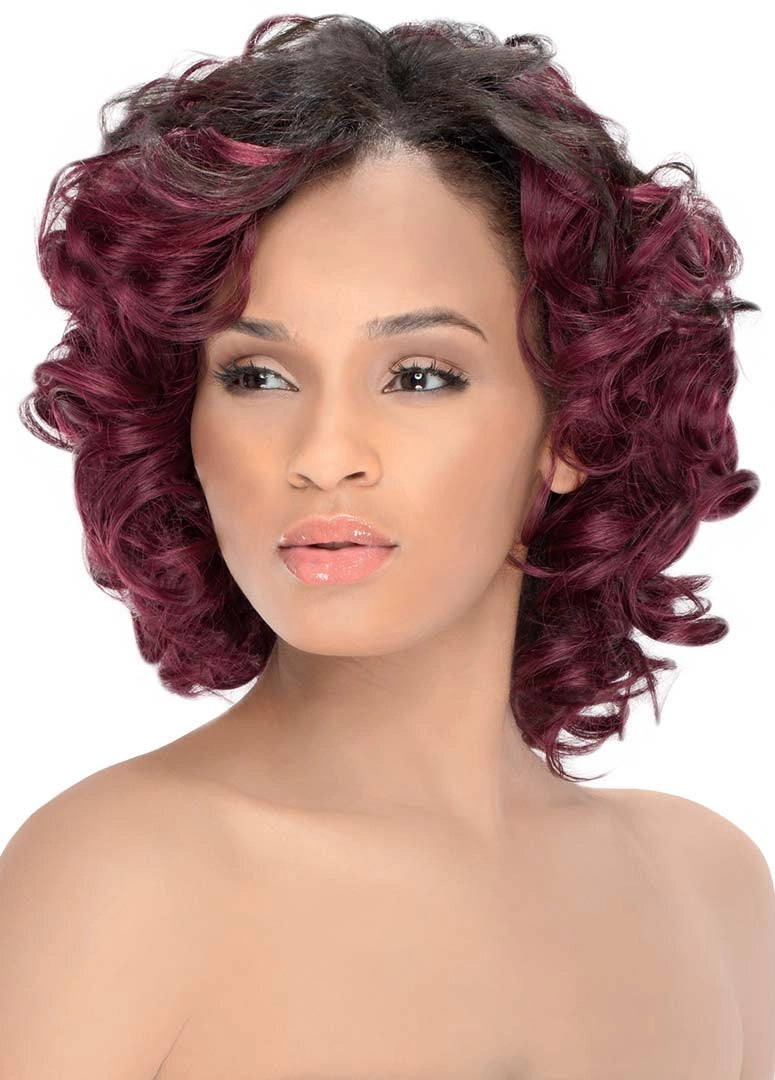 A woman modeling Purple Pack Jade Swirl, featuring a short, curly bob with dark roots and vibrant reddish-purple ends.