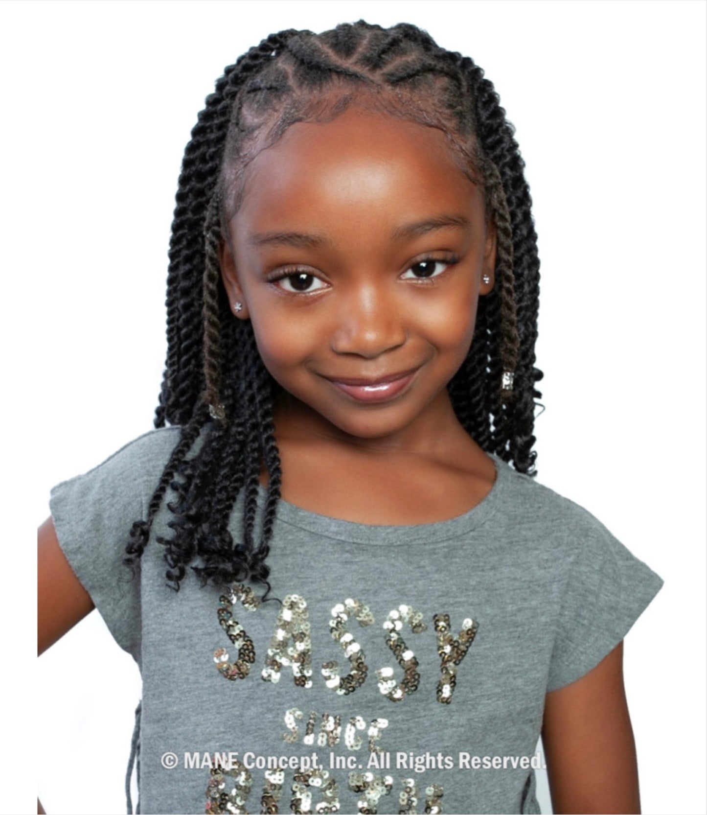 Young girl with black shoulder-length Afri Kids I Define Pre-Stretched Easy Braid twists, styled with a criss-cross braide...