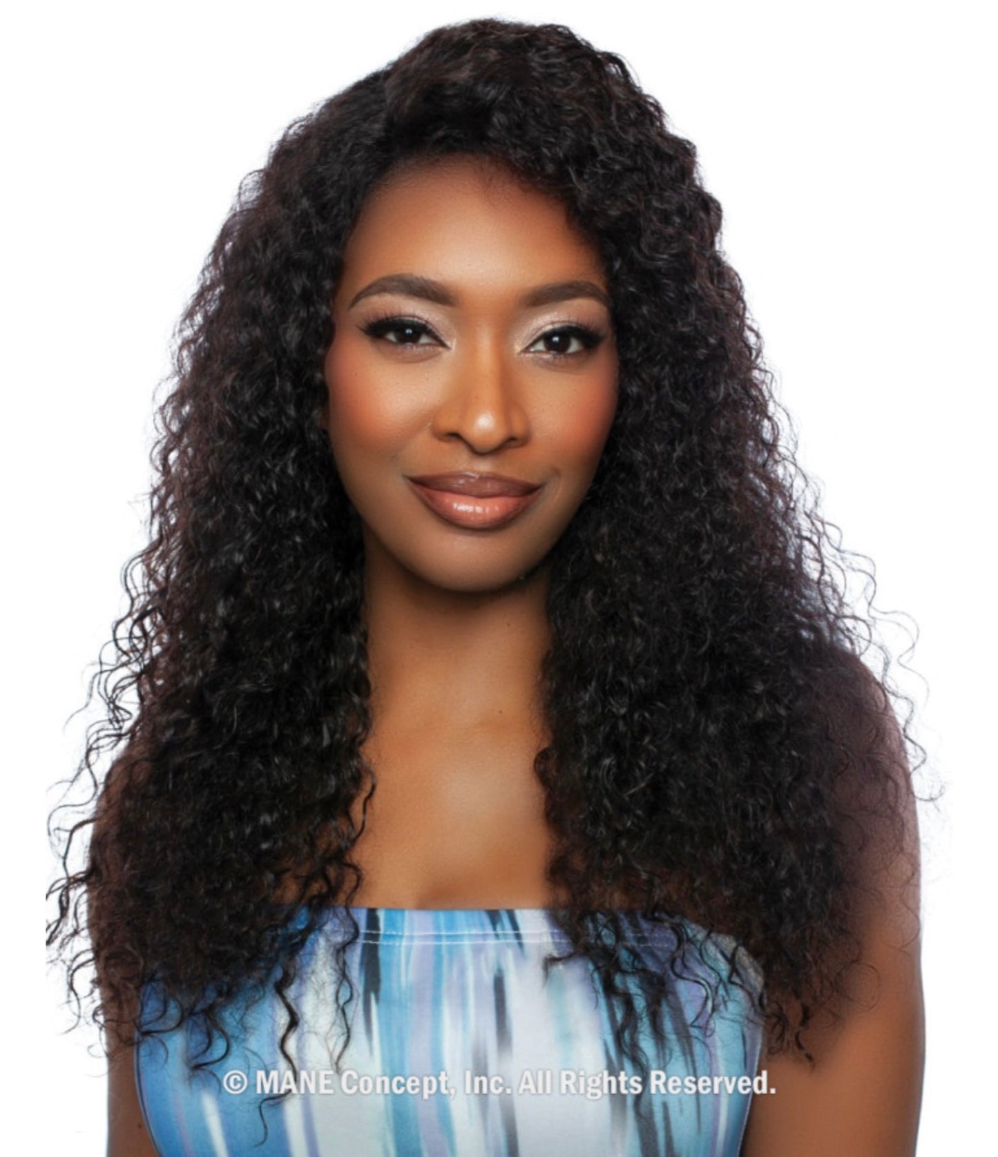 A woman models the Trill Lace Front Wig, featuring long, voluminous, dark wet and wavy Jerry curls.