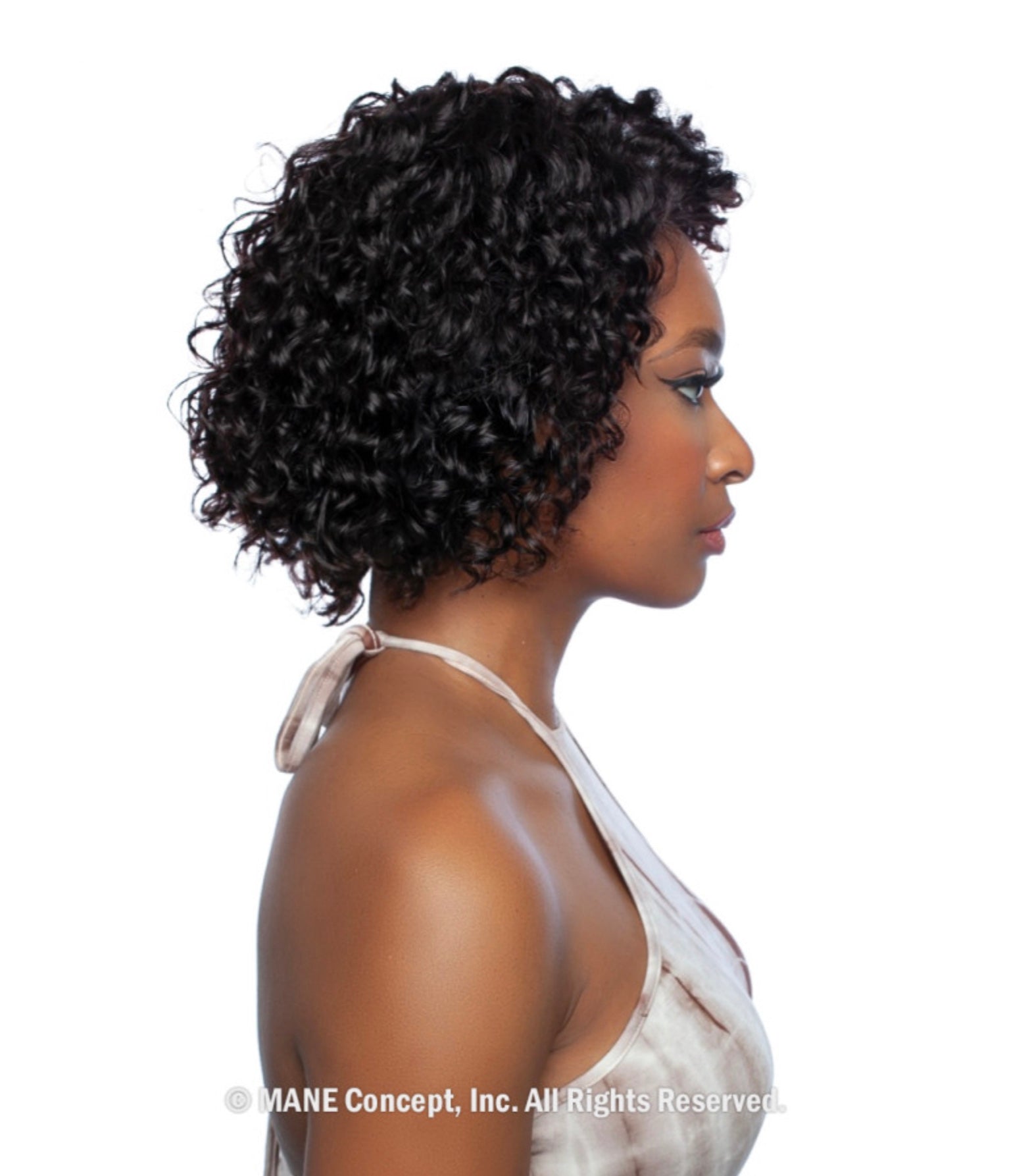 Side view of a woman wearing the Trill Lace Front Wig with short, 10-inch dark water wave curls.