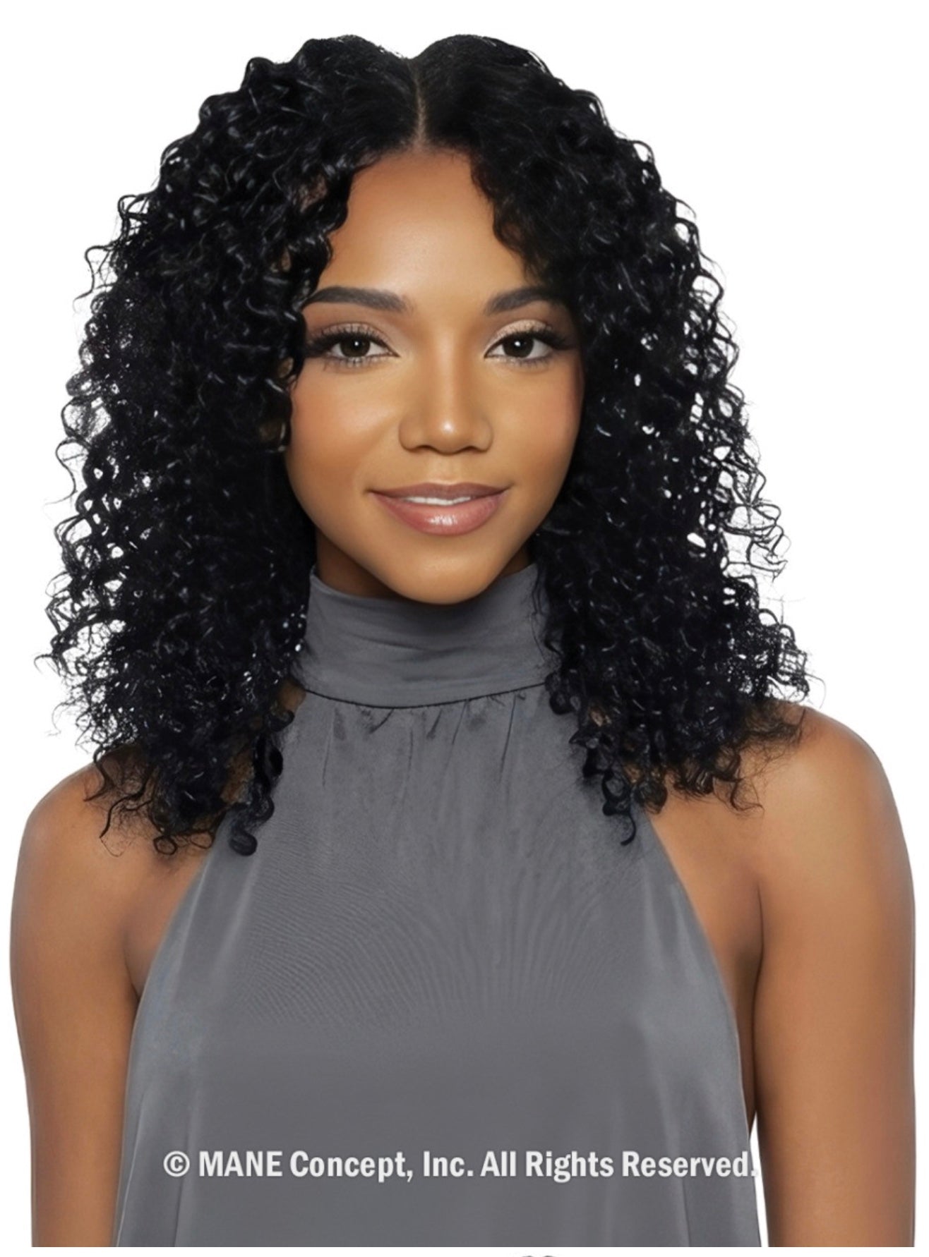 Woman wearing Pristine Micro Crochet Water Wave 12" hair. Her shoulder-length, black, very curly hair has a middle part.