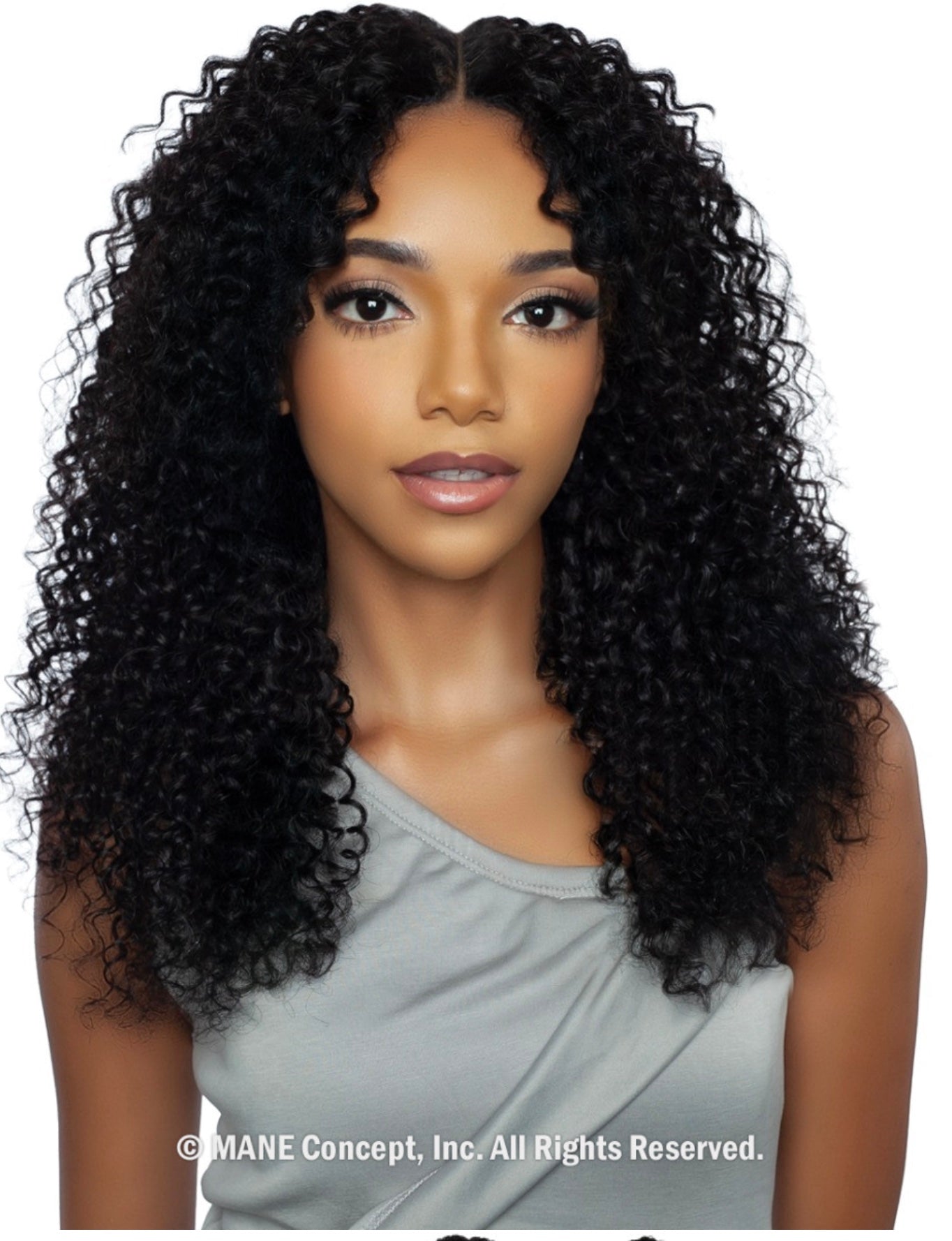 Woman wearing Pristine Micro Crochet Water Wave 18" human hair. Her long, black, voluminous curls have a middle part.