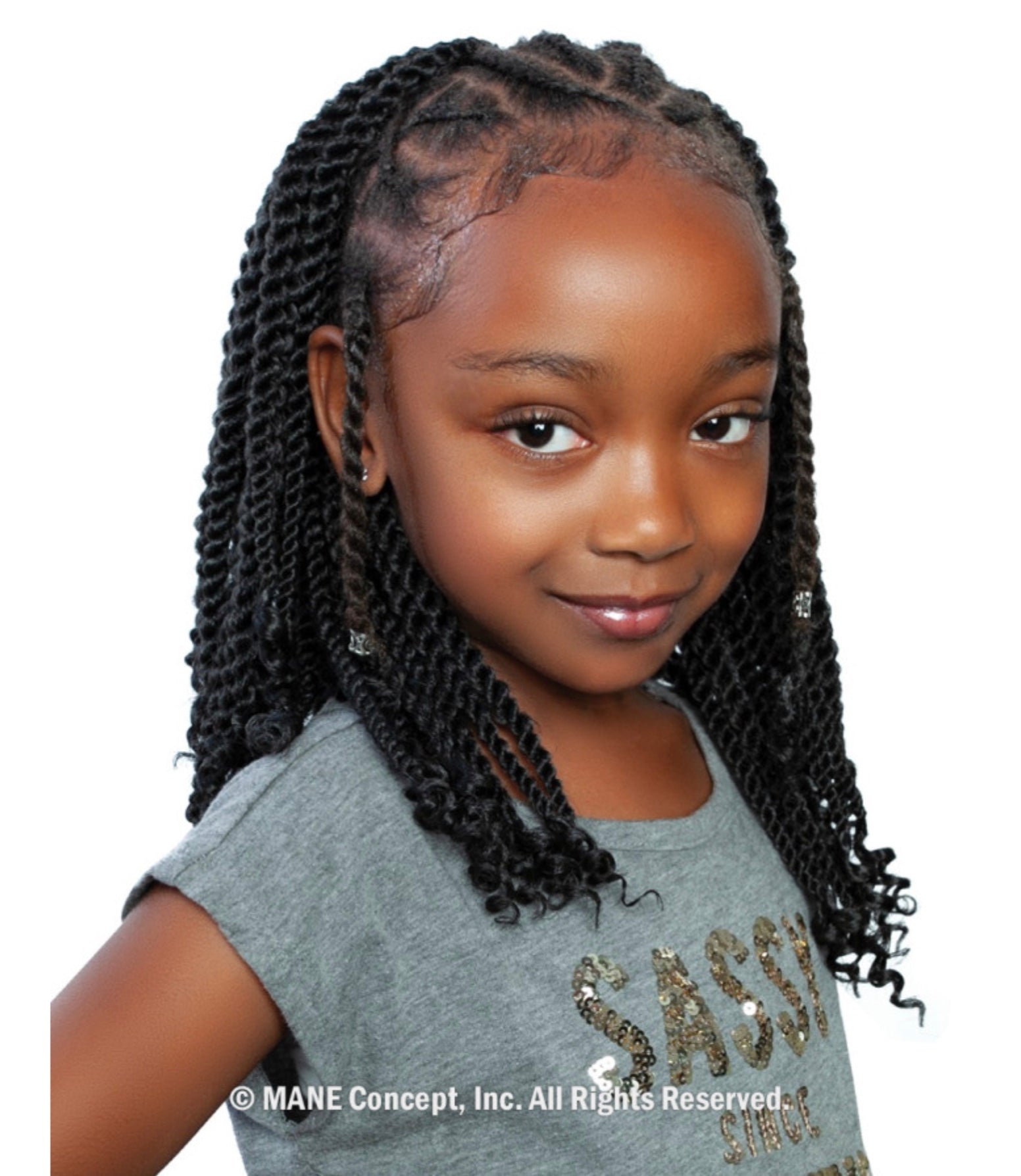 Young girl smiles, modeling Afri Kids I Define Pre-Stretched Easy Braid in black, shoulder-length twists with styled edges.
