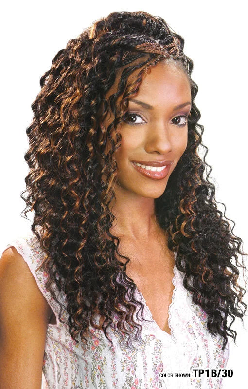 Model with long, voluminous Freetress Deep Twist 22" bulk crochet hair; dark brown with auburn curls.