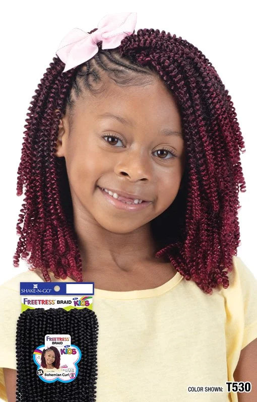 Smiling girl models Freetress Braid Kids-Bohemian Curl T530 in springy reddish-purple crochet braids; product package below.