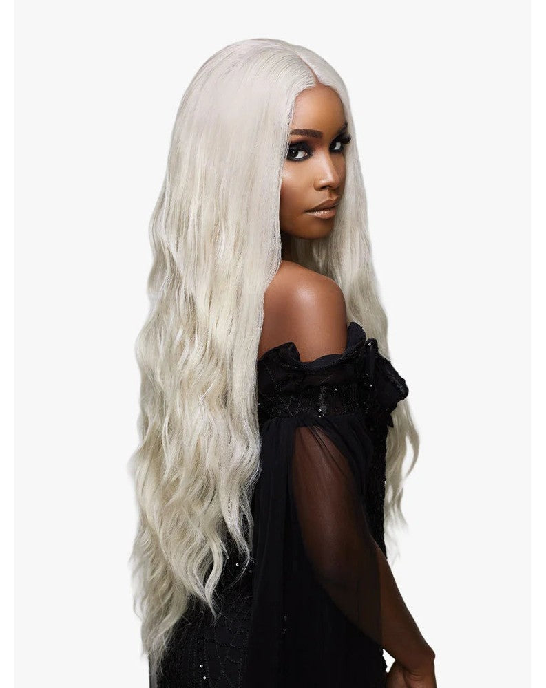 Model wears Lemelas Darcielle long, loose wavy, platinum blonde HD Glueless Lace Wig with a middle part.