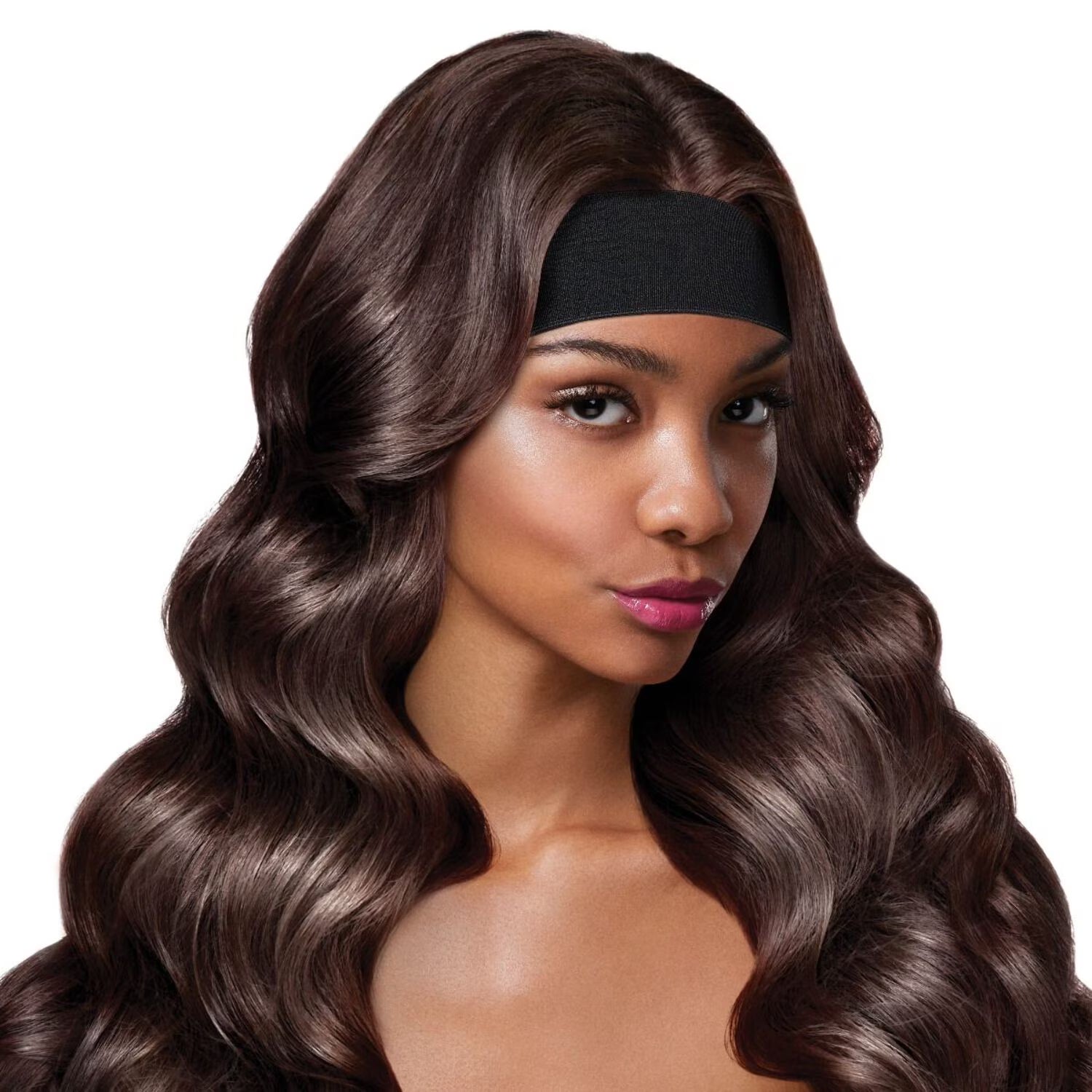 Woman with long, wavy dark brown hair wearing a wide black Red by Kiss Perfect Melt Elastic Wigband.