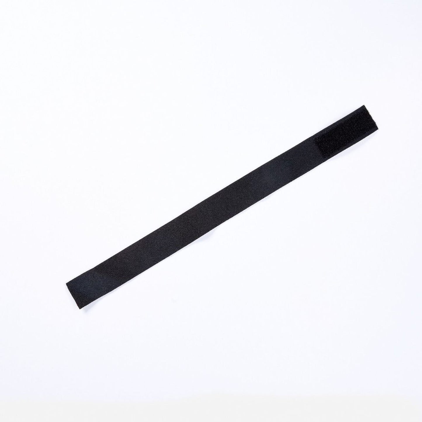 Red by Kiss Perfect Melt Elastic Wigband, a wide black 1 3/4 inch elastic band with hook-and-loop closure on white.