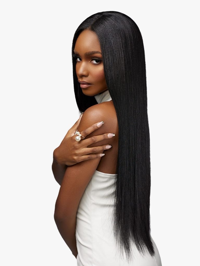 Model showcasing long, sleek, black Pearlish Virgin Remy Human Hair – STRAIGHT, styled with a deep side part.