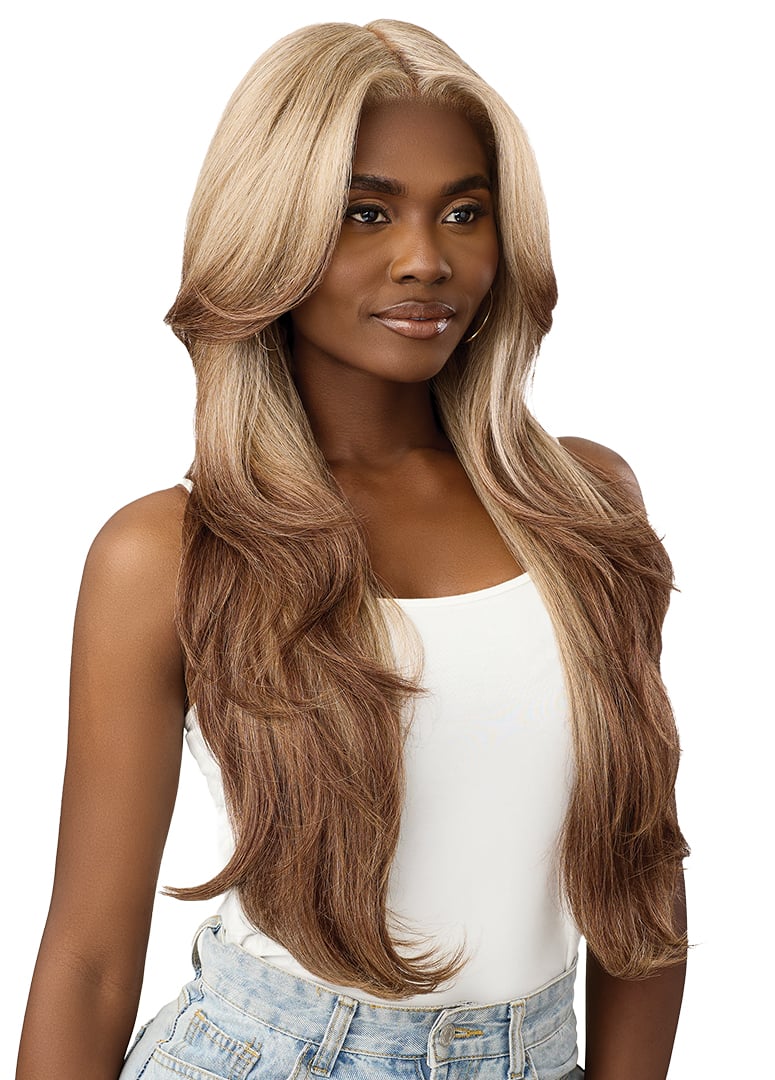 Perfect Hair Line OnVybes 9 HD Lace Front Wig. Long, wavy, layered blonde hair with brown undersides, worn by a woman.