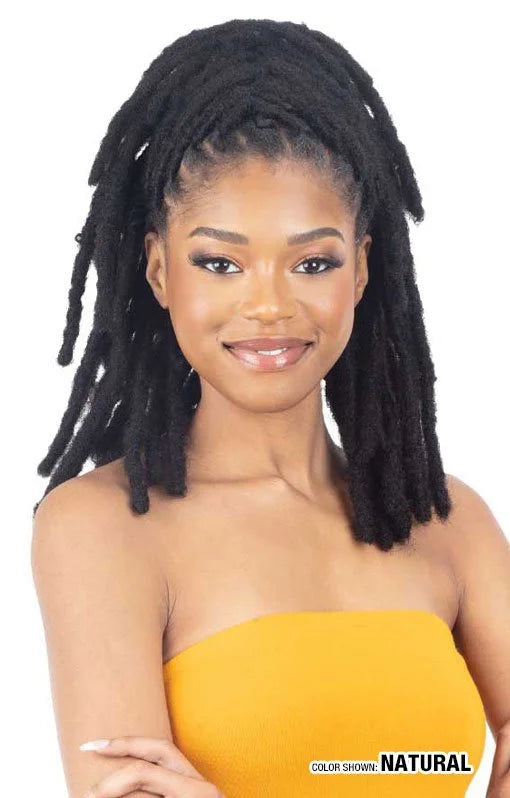Young woman models textured natural black Ibiza 100% Human Hair Locs, styled half-up, half-down, shoulder-length.