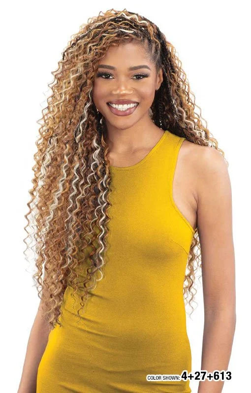 Smiling woman with FREETRESS BOHO DEEP BULK hair: long, deep curly, multi-toned brown and blonde style.