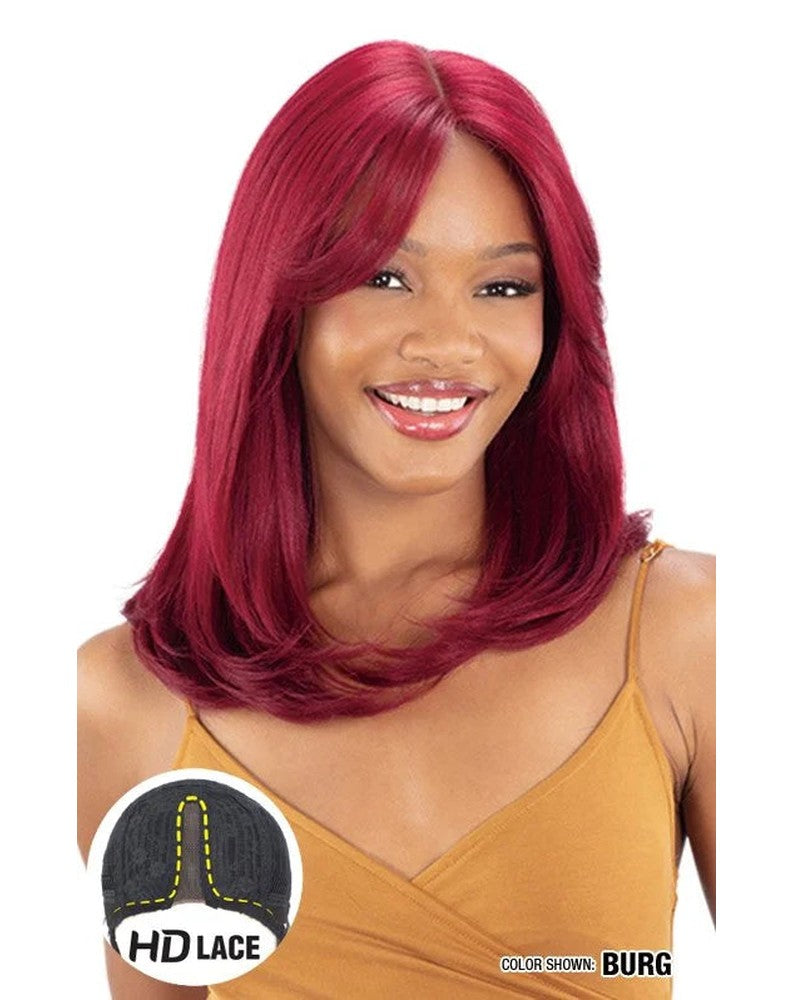 Woman models Freetress Equal HD Lace Front Wig in burgundy, shoulder-length, straight with curtain bangs.