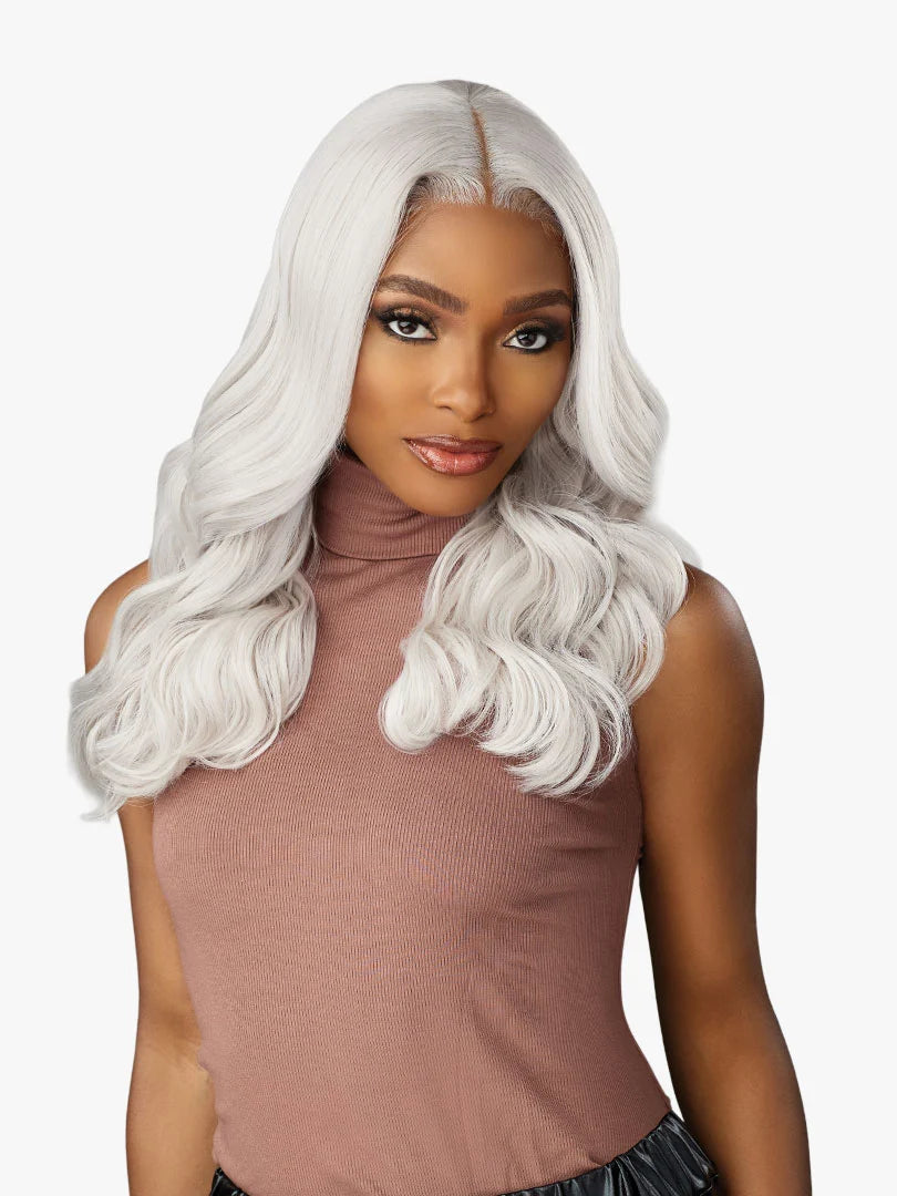 Shear Muse Gold Krush Lanisha wig: Woman with long, wavy silver-blonde hair and a sleek center part.