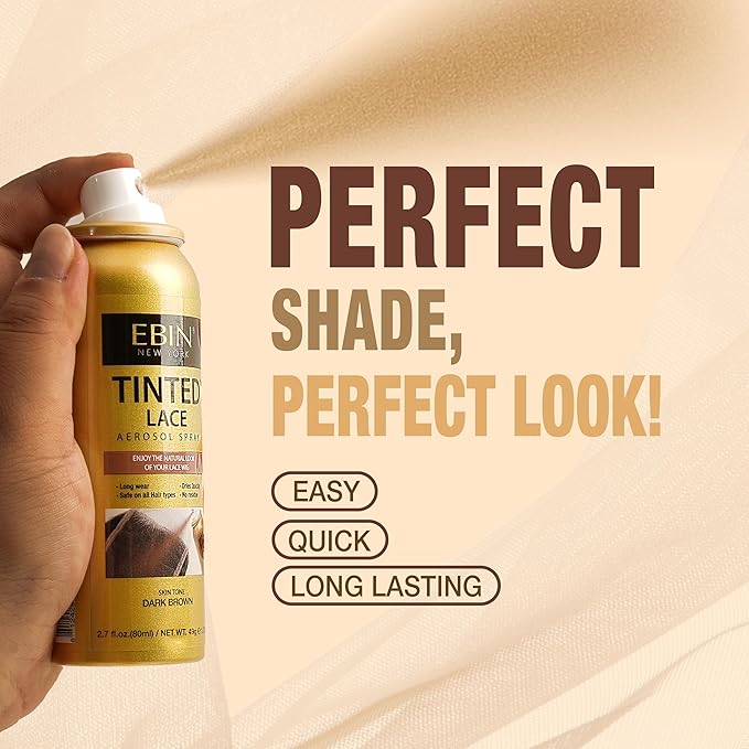 A hand sprays EBIN Tinted Lace Aerosol Spray in Dark Brown. The gold can shows product details and a dark brown hair texture.