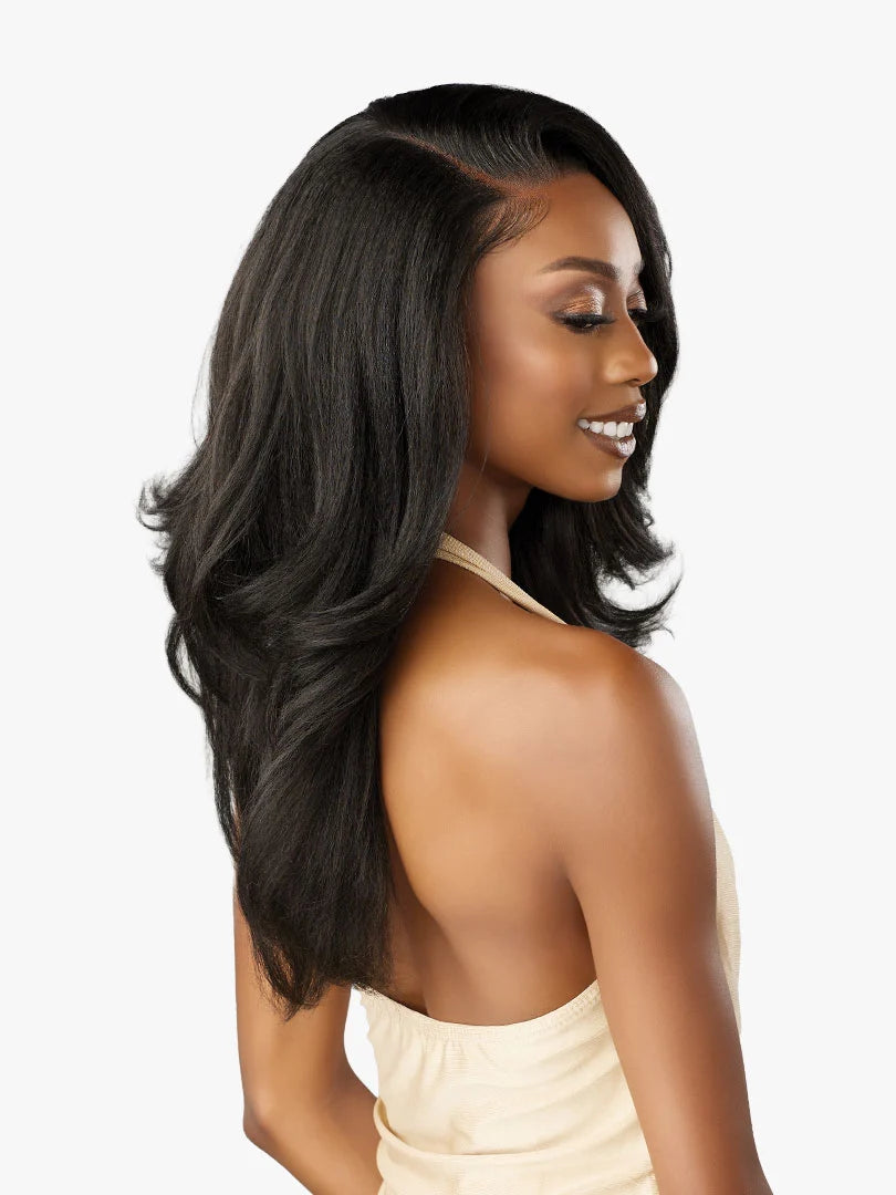 Woman models Cloud 9 What Lace? Evadra wig. Long, voluminous black hair with a deep side part & layered, curled ends.