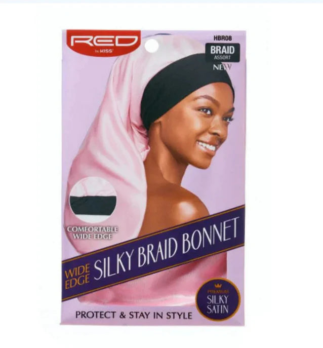 Product packaging for RED By Kiss Luxury Satin Wide Edge Braid Bonnet in pink, modeled by a smiling woman.
