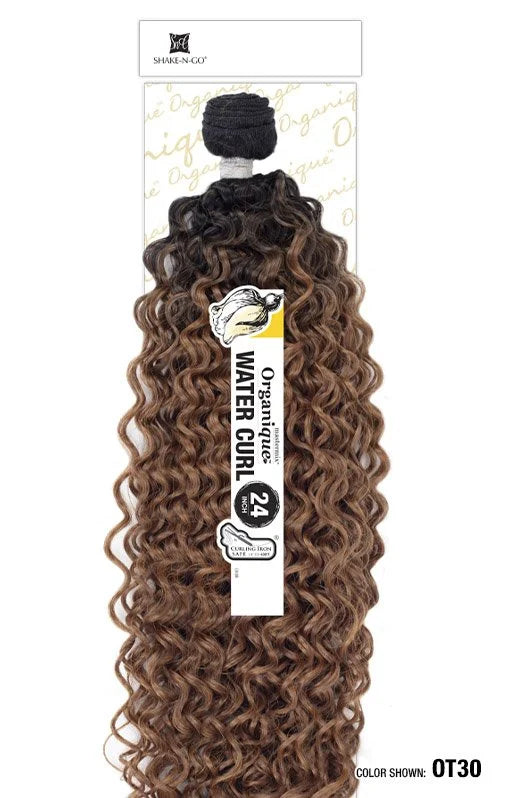 Organique Water Curl synthetic hair bundle, 24-inch, with dark roots fading to warm auburn water curls.