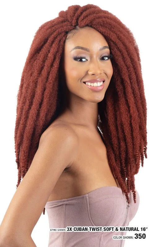 Smiling woman with long, voluminous Equal 3X Cuban Twist 22" braids in a soft, natural reddish-brown.